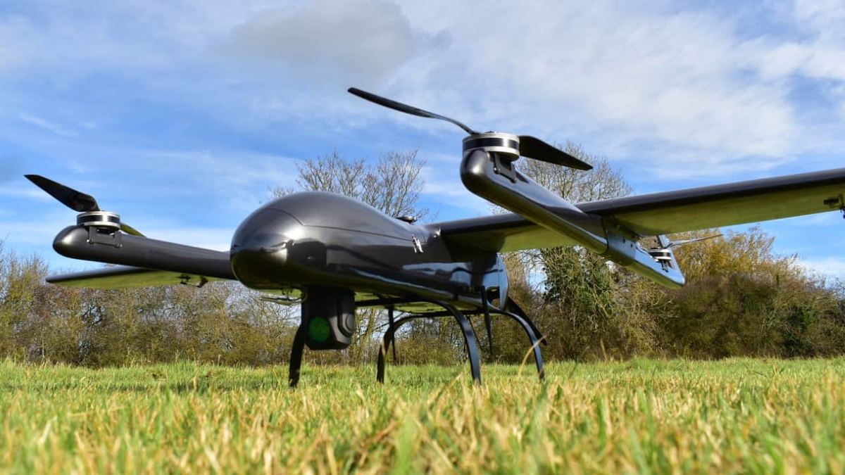Fixed-wing VTOL drone on grass