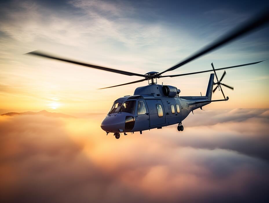 Helicopter flying above the clouds